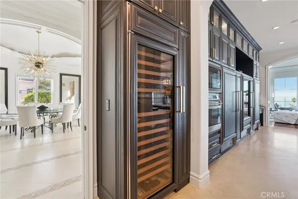 a spacious bedroom with a bed and a cabinets