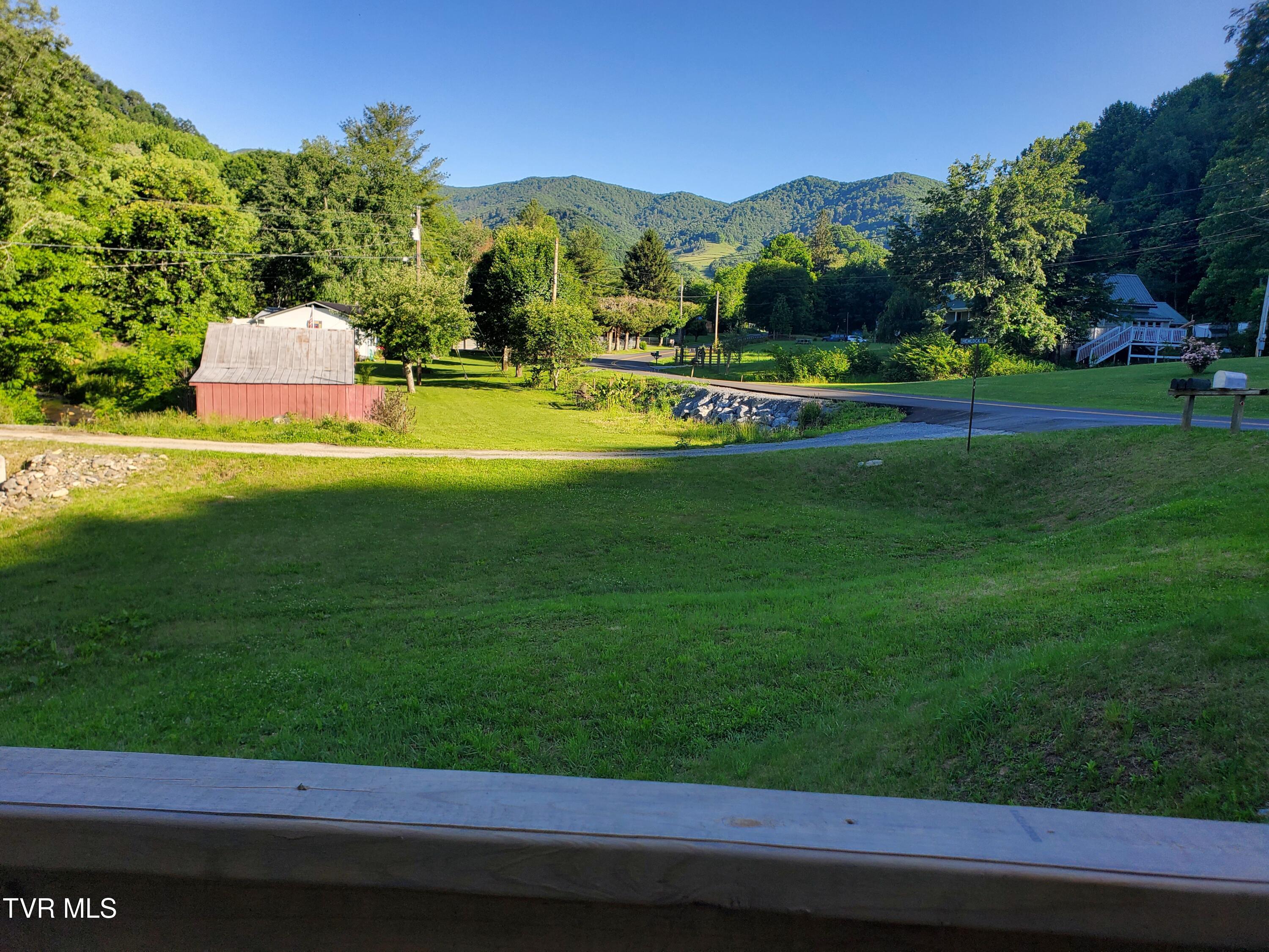 673 Hampton Creek Road Roan Mountain, TN 37687 - Photo 3 of 46 20260603_182724