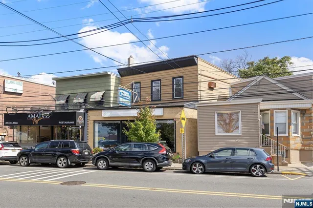 a view of a car parked in front of a building