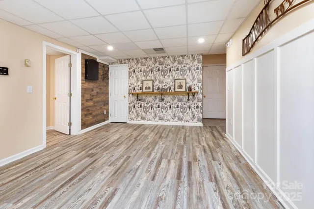 a view of entryway with wooden floor