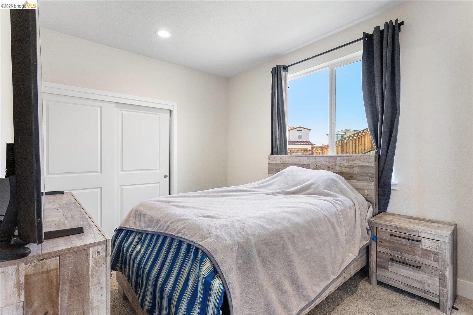 5601 Ridgepoint Way Antioch, CA 94531 - Photo 19 of 59 Bedroom featuring light-colored walls and carpet flooring