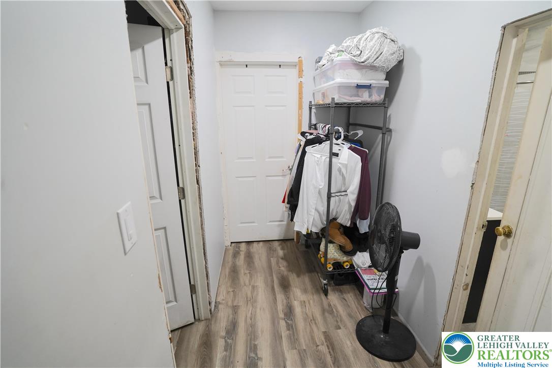 3863 Mauch Chunk Road Coplay, PA 18037 - Photo 16 of 33 a view of walk in closet with clothes and shoes