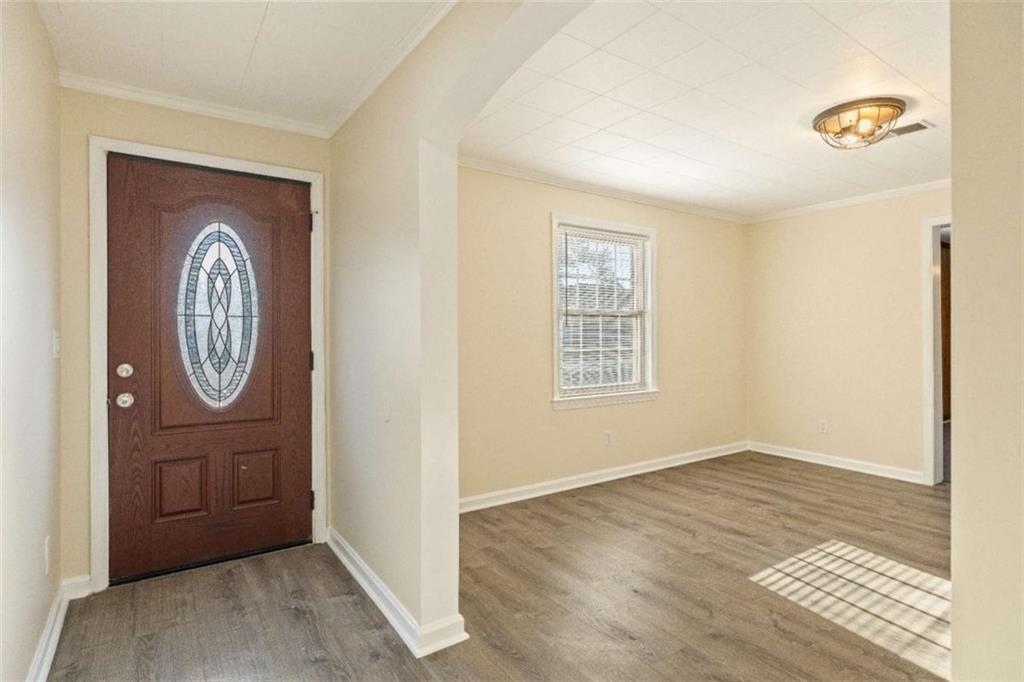614 Burnett Ferry Road Southwest Rome, GA 30165 - Photo 2 of 29 an empty room with window