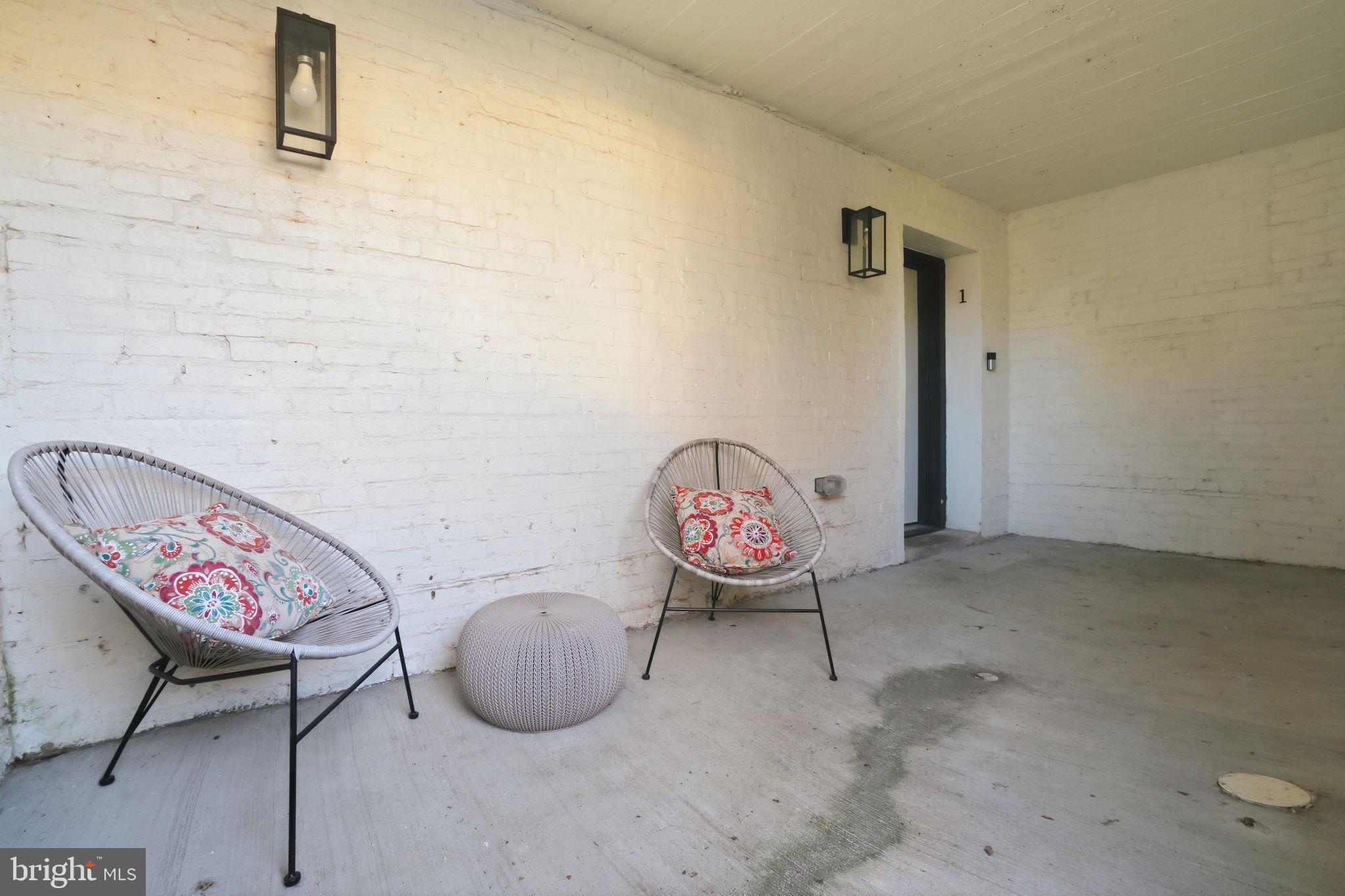 616 Quebec Place Northwest, Unit 1 Washington, DC 20010 - Photo 21 of 26 a view of a room with a table and chairs