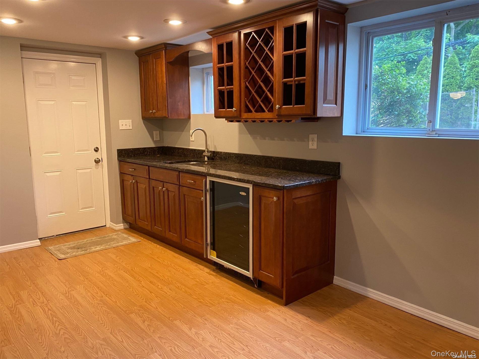 23 Duncan Lane Huntington, NY 11743 - Photo 13 of 25 a kitchen with a sink and a window