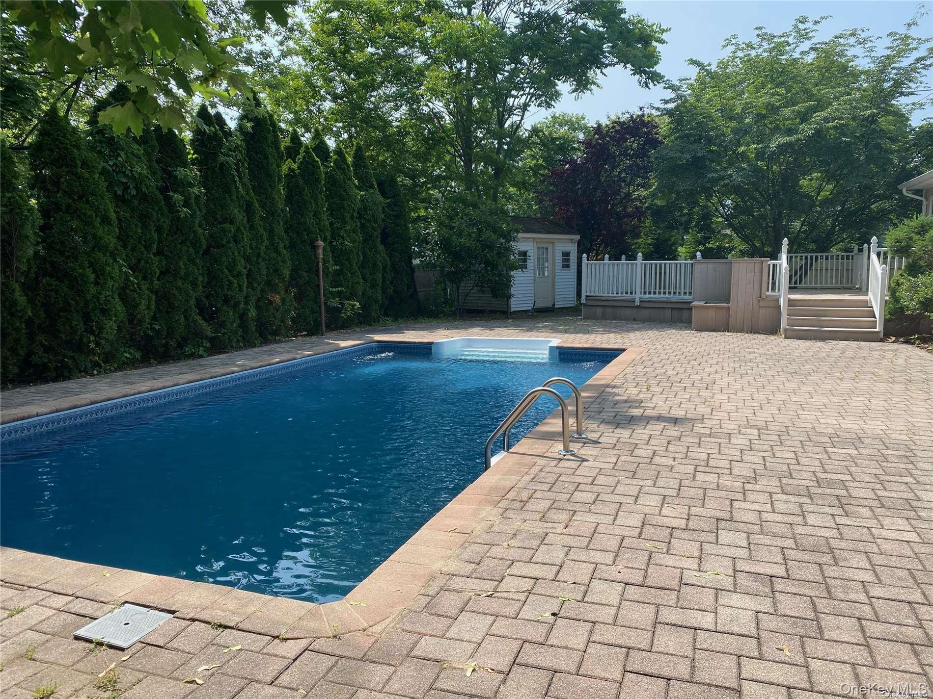 23 Duncan Lane Huntington, NY 11743 - Photo 25 of 25 a view of a backyard