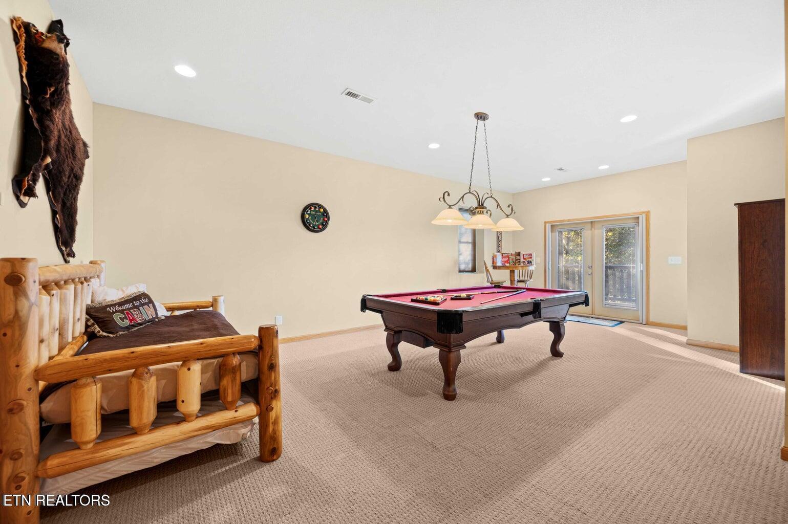 836 Sandra Way Kodak, TN 37764 - Photo 30 of 49 30_walk out basement with pool table