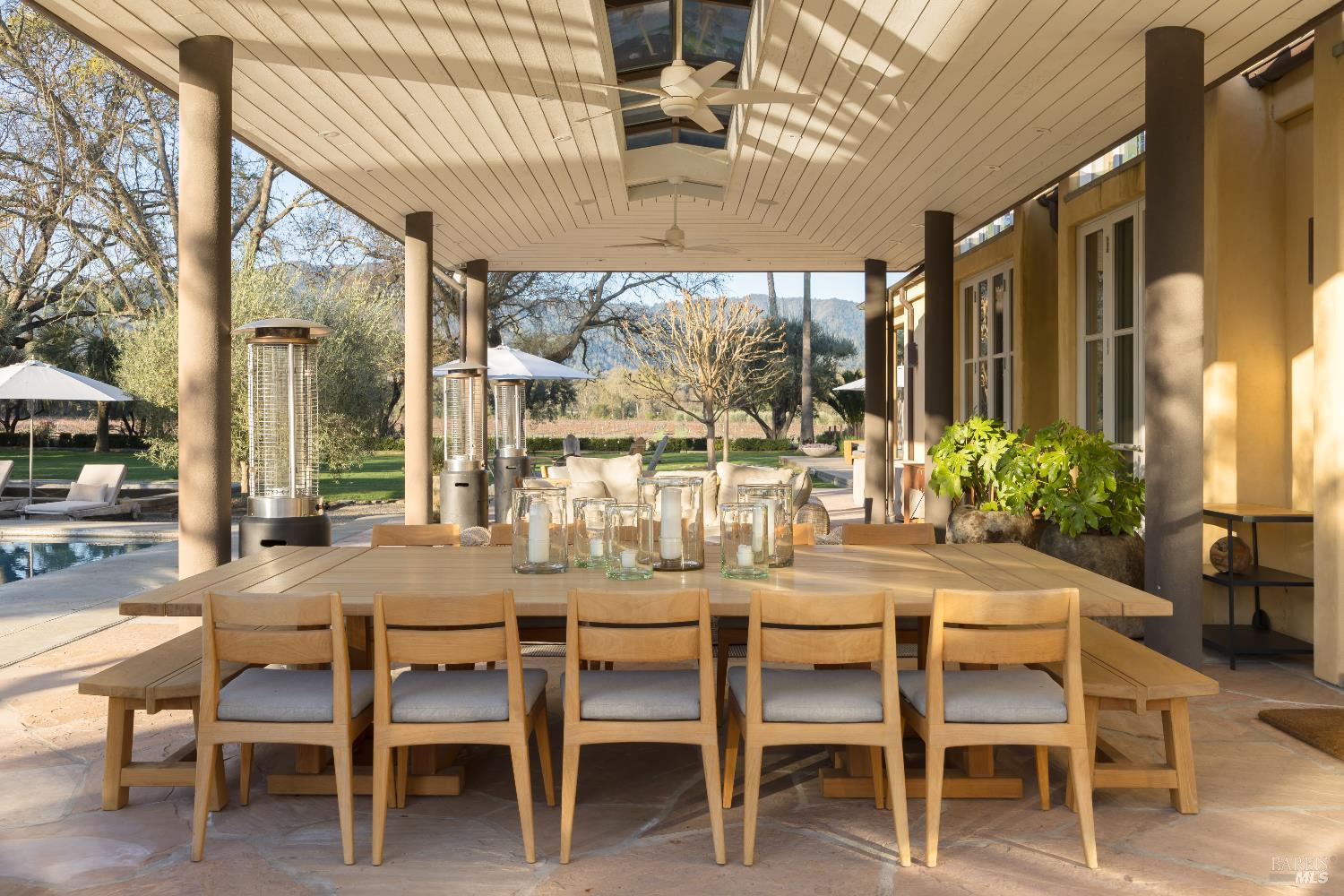 900 Rutherford Road St. Helena, CA 94574 - Photo 16 of 70 a dining room with furniture a chandelier and a rug
