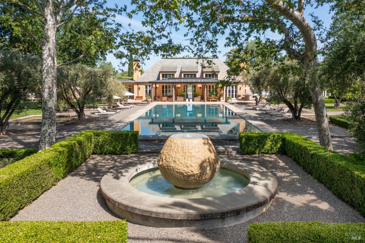 900 Rutherford Road St. Helena, CA 94574 - Photo 3 of 70 a view of a house with a yard patio and tree