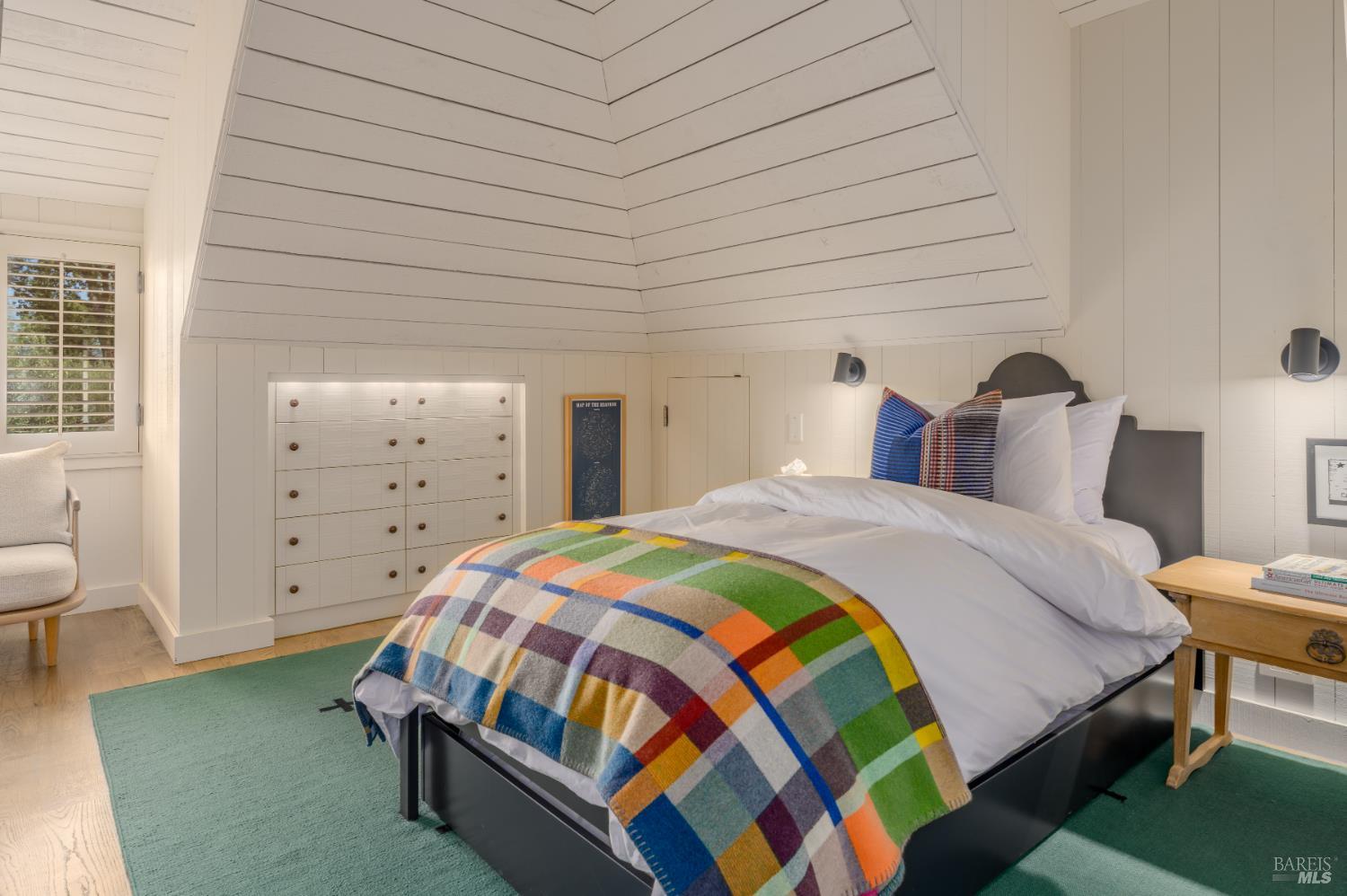 900 Rutherford Road St. Helena, CA 94574 - Photo 41 of 70 a bedroom with a bed and a cabinets