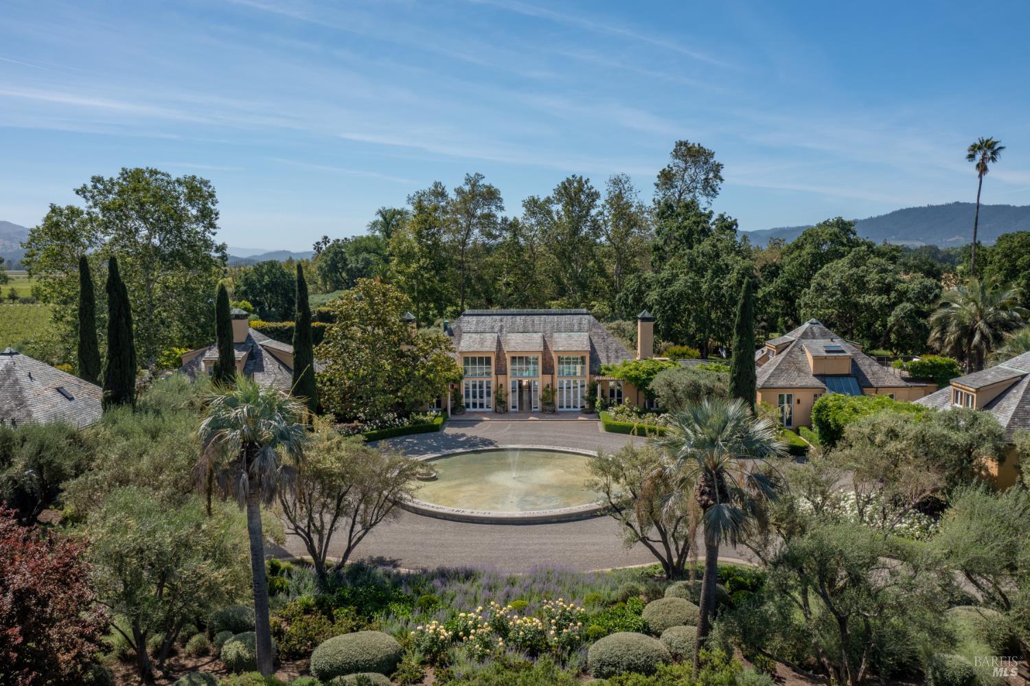 900 Rutherford Road St. Helena, CA 94574 - Photo 8 of 70 a view of a swimming pool with a patio and a yard