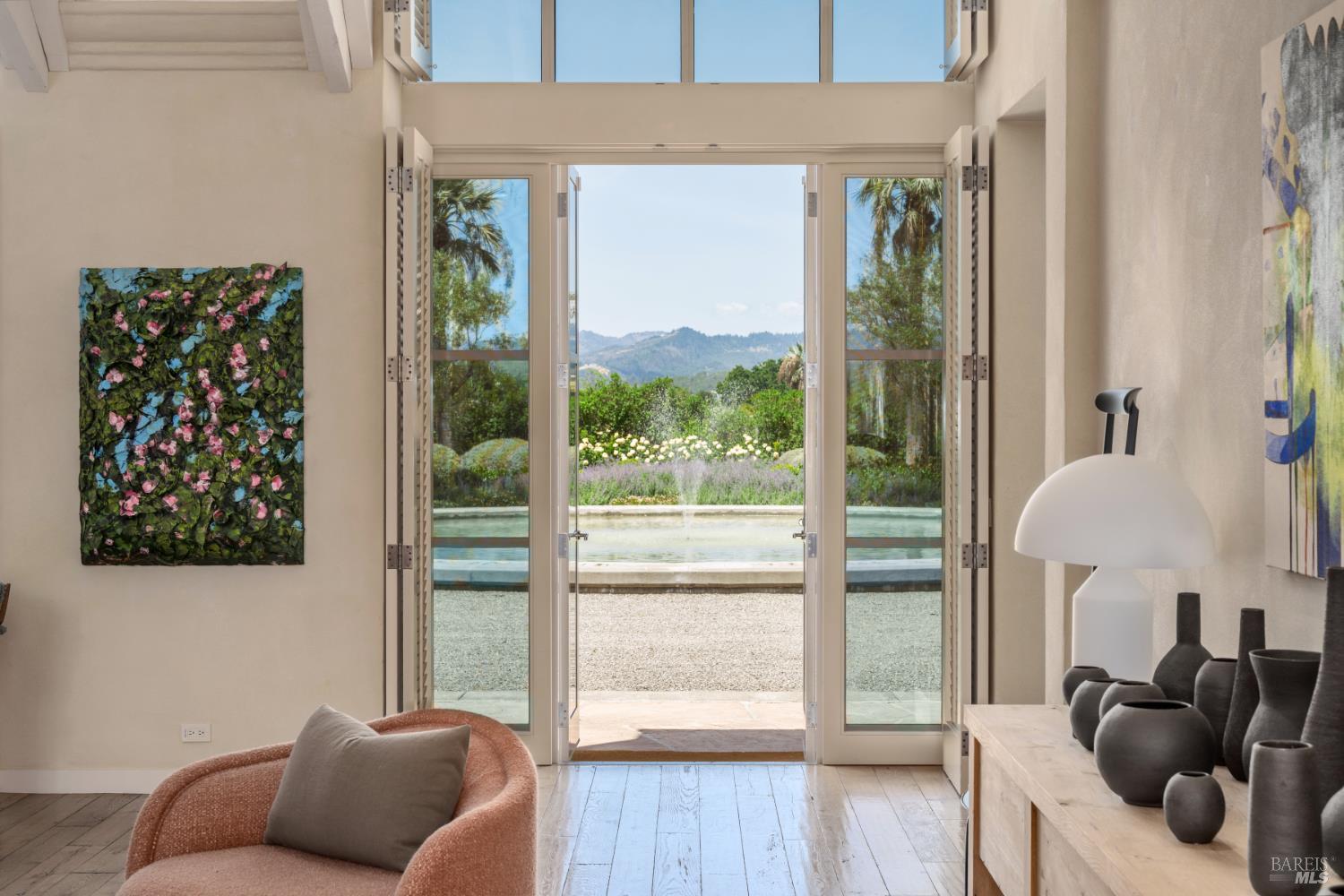 900 Rutherford Road St. Helena, CA 94574 - Photo 9 of 70 a living room with furniture and a large window