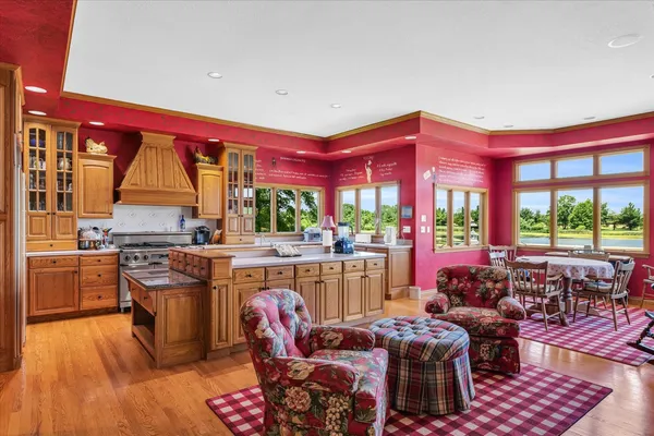 a living room with furniture fireplace and a flat screen tv
