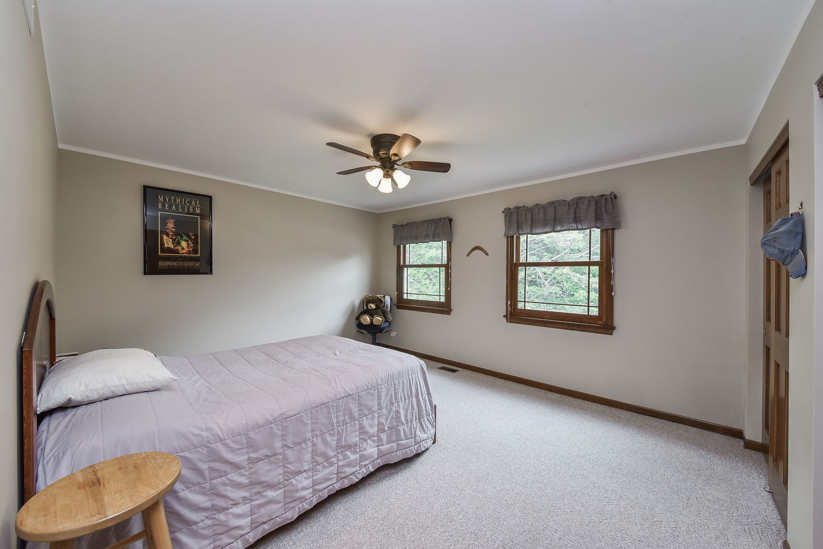 220 Aldrin Avenue Batavia, IL 60510 - Photo 14 of 23 a bedroom with a bed and a chandelier