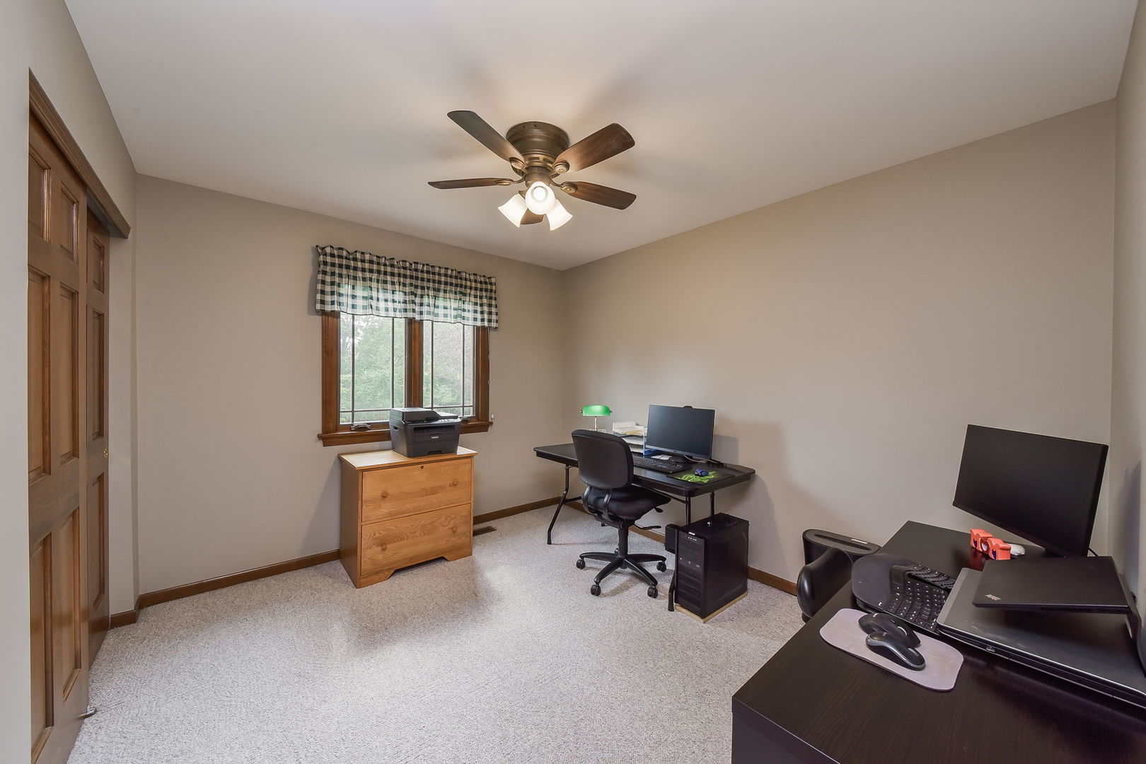 220 Aldrin Avenue Batavia, IL 60510 - Photo 16 of 23 a livingroom with workspace and a window