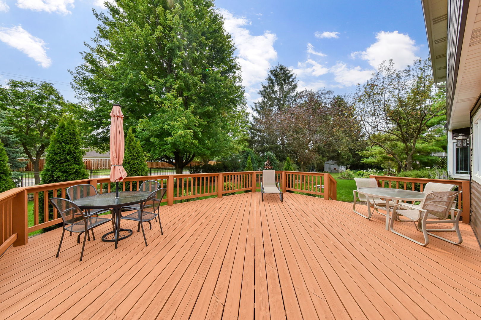 220 Aldrin Avenue Batavia, IL 60510 - Photo 21 of 23 a balcony with wooden floor table and chairs