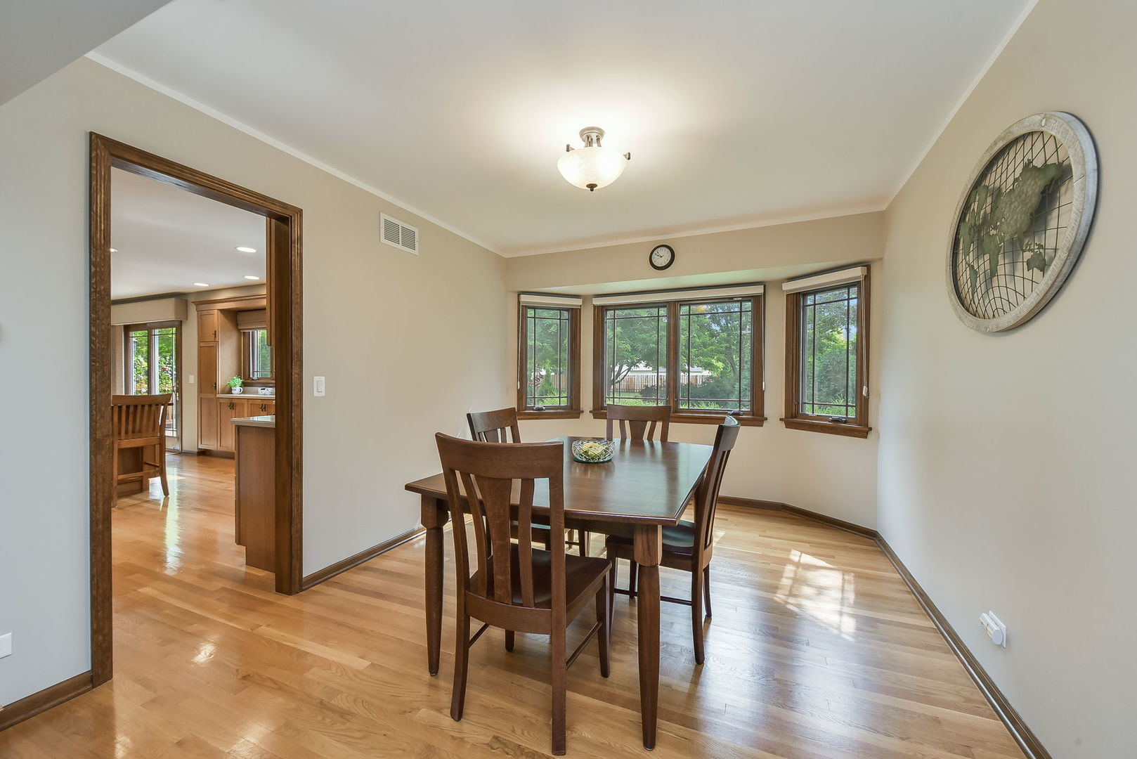 220 Aldrin Avenue Batavia, IL 60510 - Photo 4 of 23 a view of a dining room with furniture and wooden floor