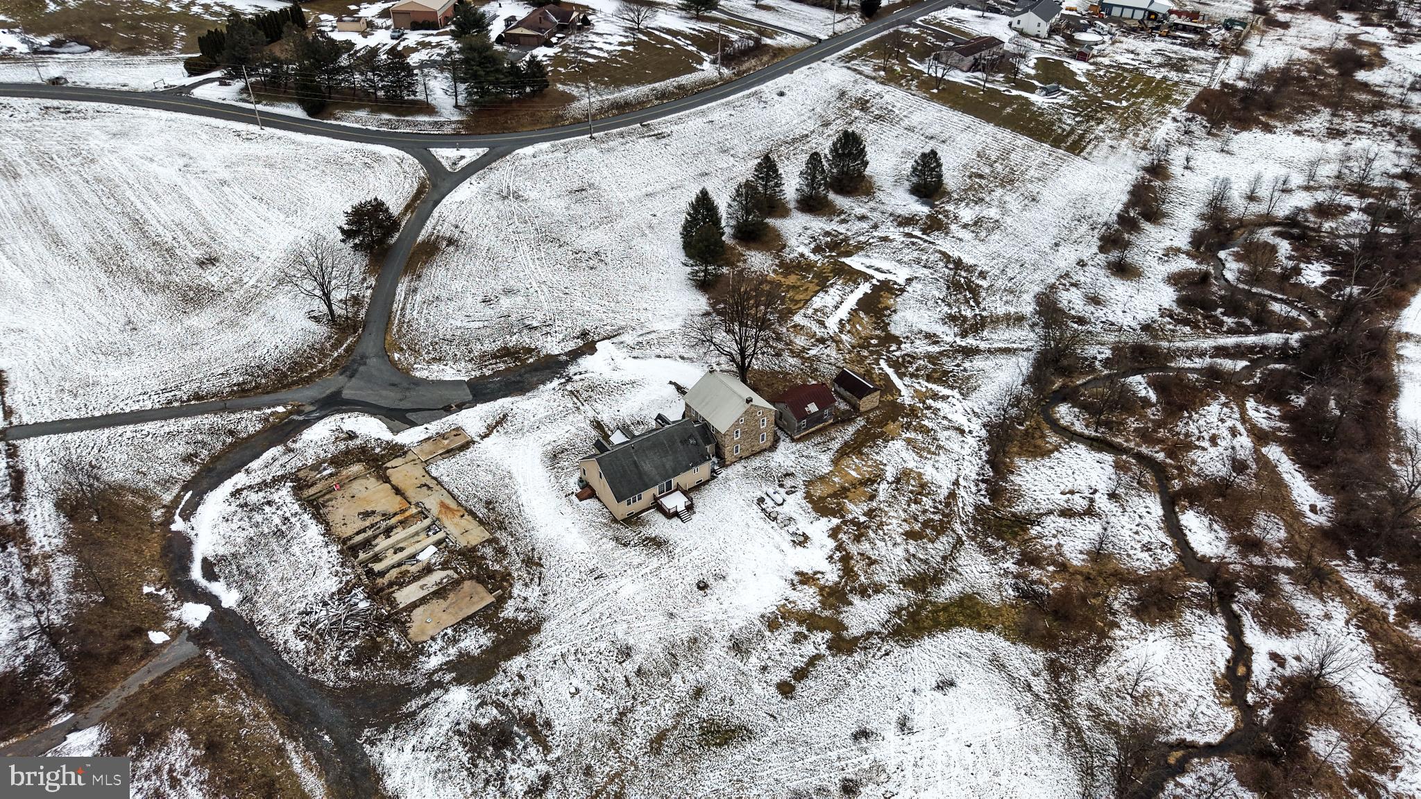 71 Walnut Road Hamburg, PA 19526 - Photo 9 of 55 Snow-covered landscape with a rustic home.