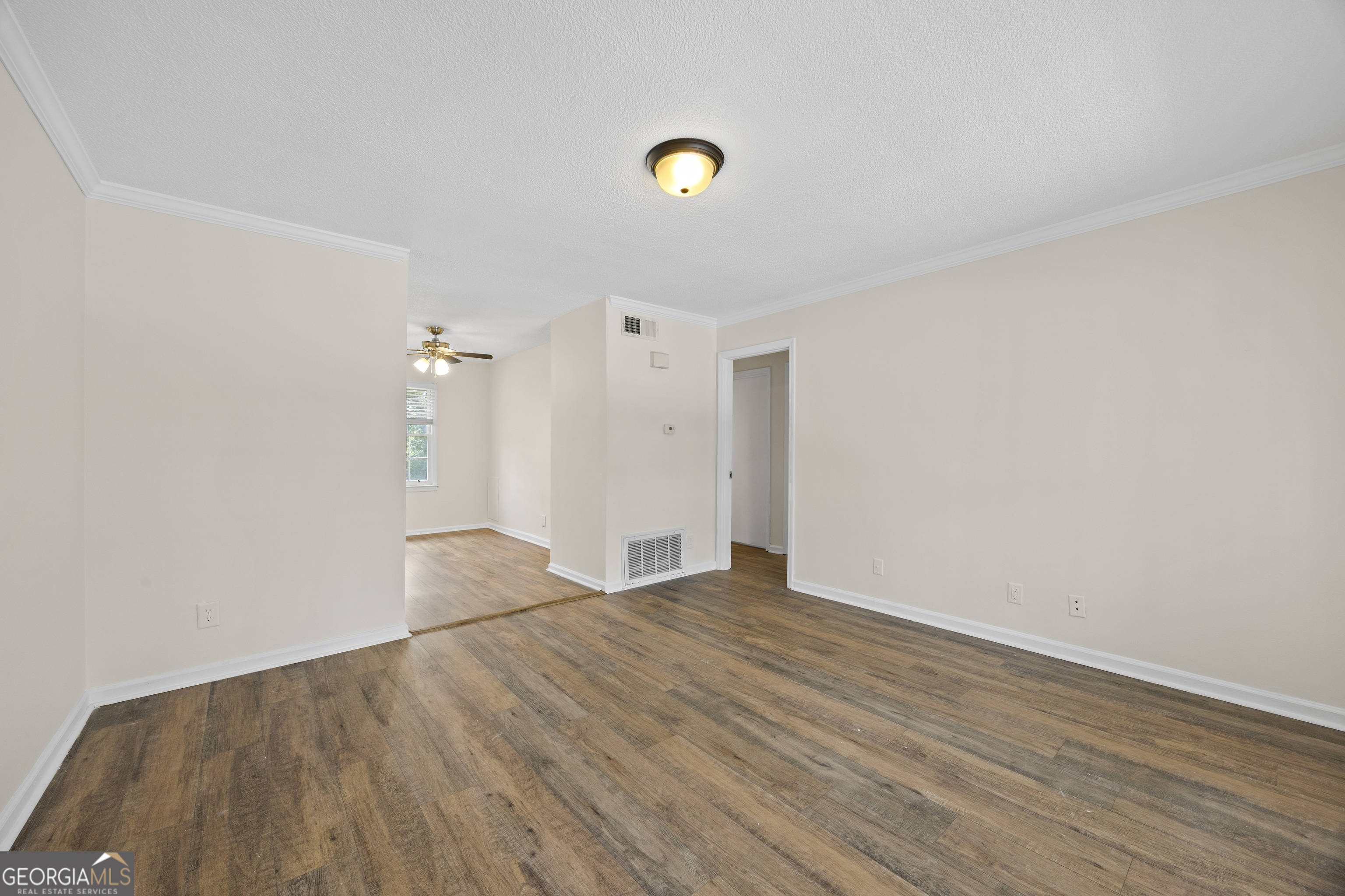 135 Hill Street, Unit 22 Decatur, GA 30030 - Photo 10 of 36 a view of an empty room and wooden floor