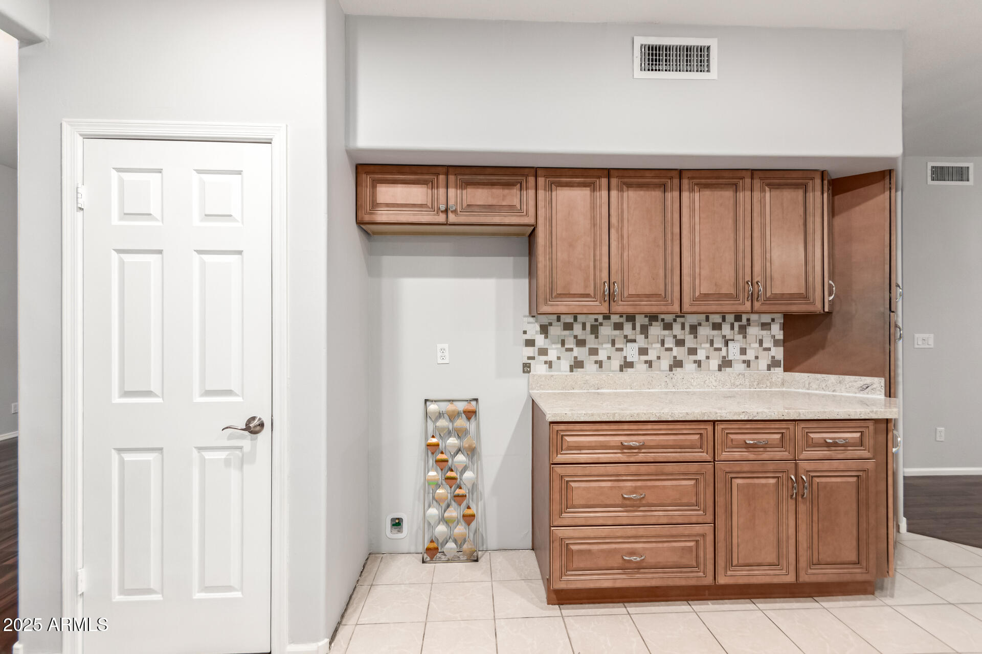 518 South Pueblo Street Gilbert, AZ 85233 - Photo 18 of 50 a bathroom with a sink and a mirror