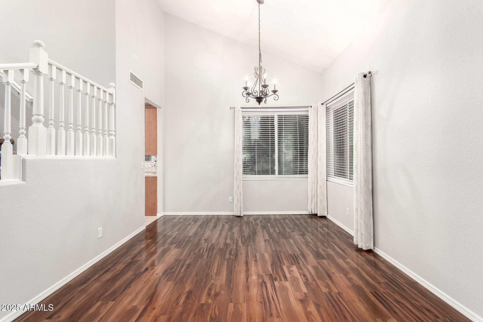 518 South Pueblo Street Gilbert, AZ 85233 - Photo 10 of 50 a view of empty room with wooden floor and fan
