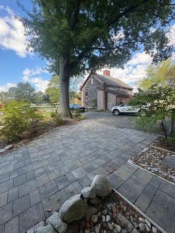 a backyard of a house with lots of green space