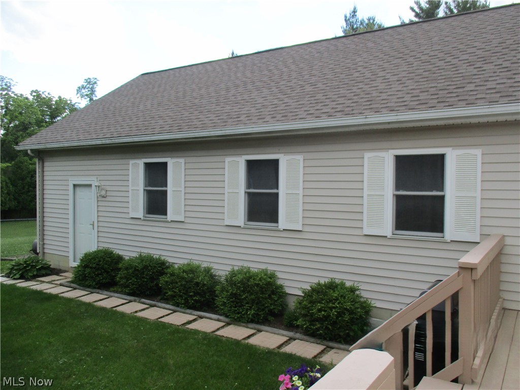 7540 Kennard Road Seville, OH 44273 - Photo 31 of 37 View of side of property with a yard