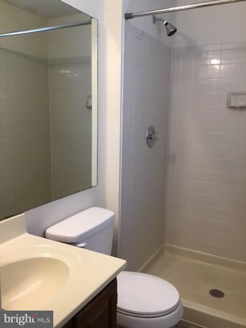 6394 Devonshire Lane Frederick, MD 21703 - Photo 16 of 30 a bathroom with a sink a toilet and shower