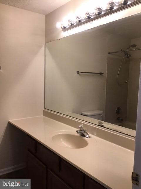 6394 Devonshire Lane Frederick, MD 21703 - Photo 20 of 30 a bathroom with a sink and a mirror