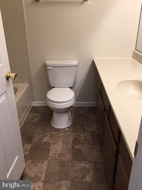 6394 Devonshire Lane Frederick, MD 21703 - Photo 21 of 30 a white toilet sitting next to a white sink