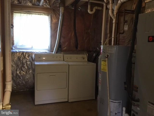6394 Devonshire Lane Frederick, MD 21703 - Photo 27 of 30 a utility room with dryer and washer