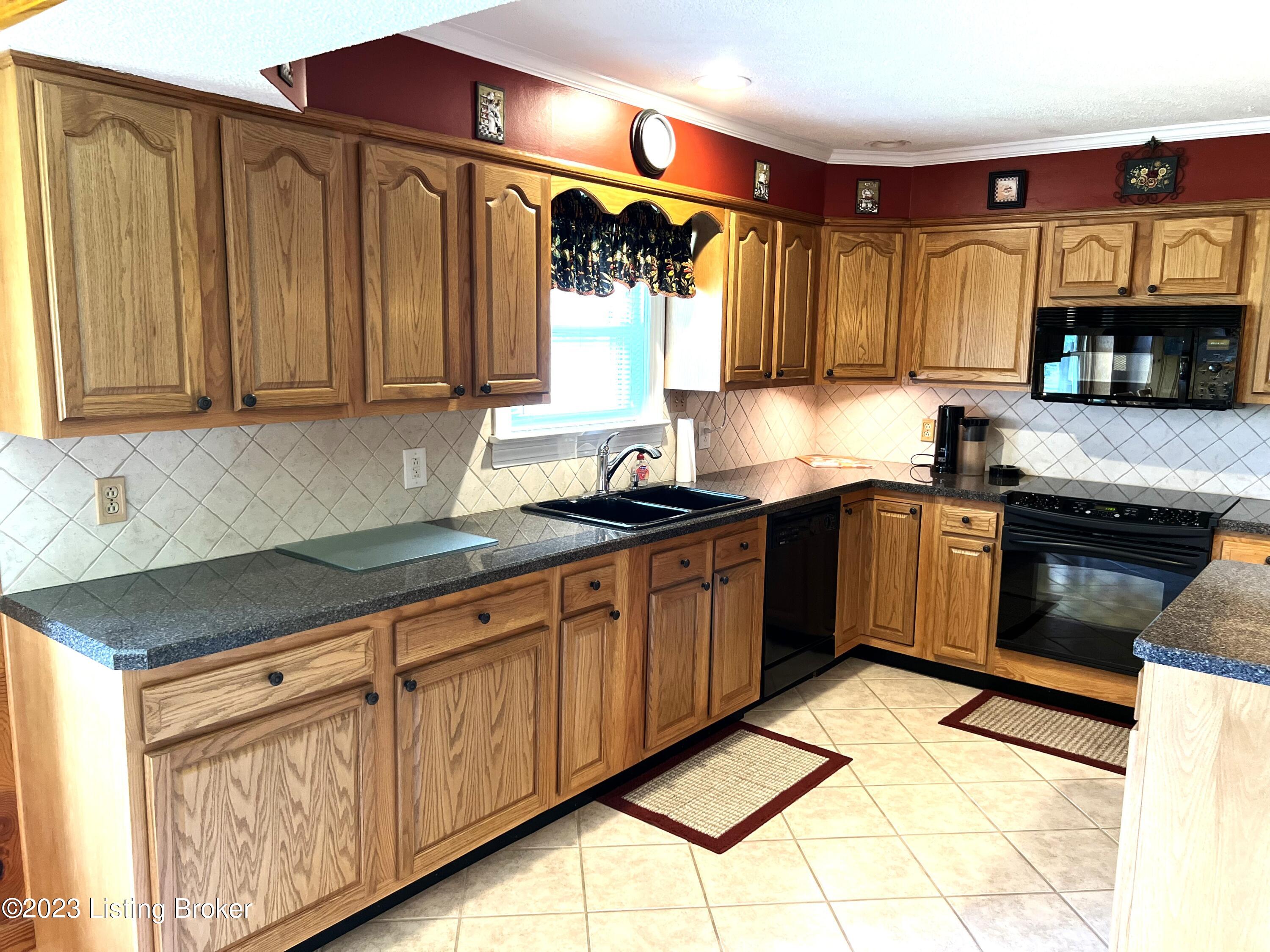 6105 Pendleton Road Louisville, KY 40272 - Photo 8 of 56 Lots of oak cabinets!