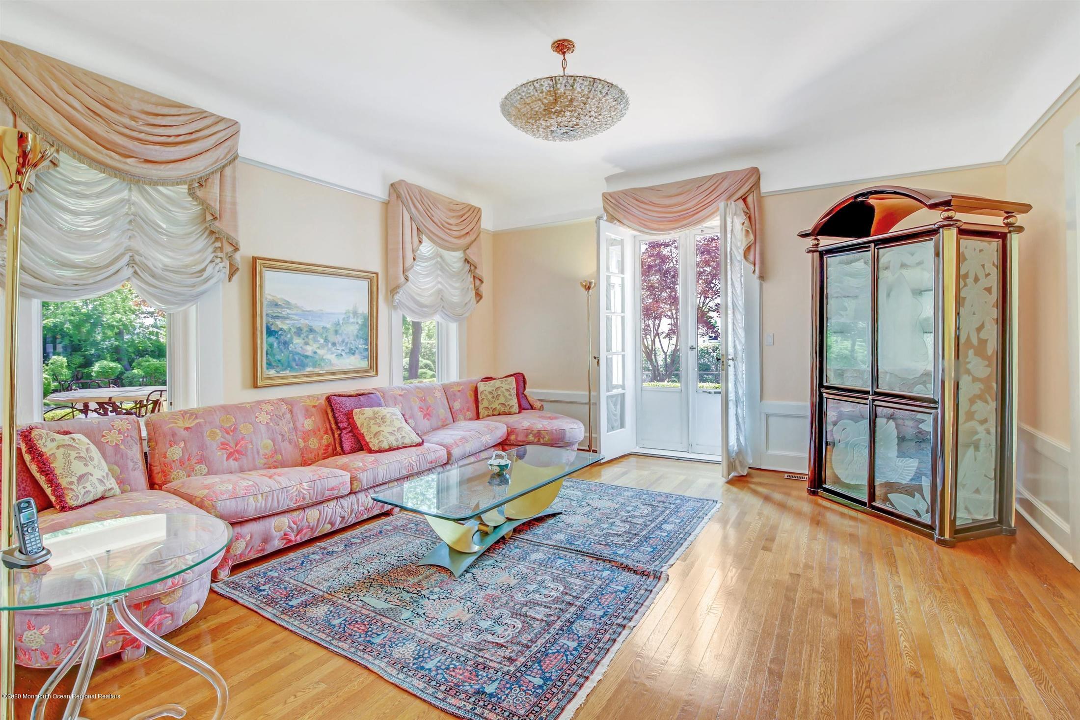 45 Runyan Avenue Deal, NJ 07723 - Photo 16 of 60 a living room with patio area and a rug