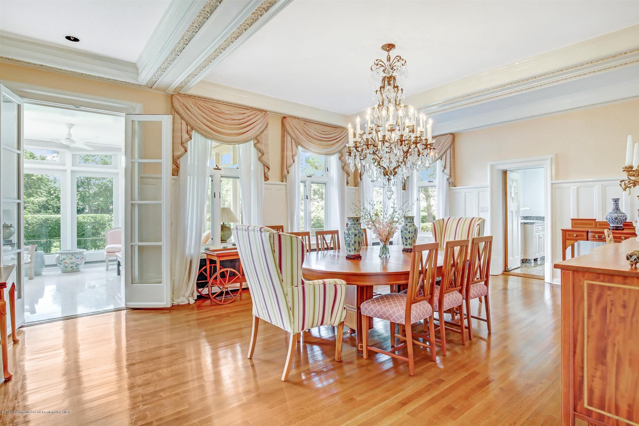 45 Runyan Avenue Deal, NJ 07723 - Photo 17 of 60 a view of a dining room with furniture window and wooden floor