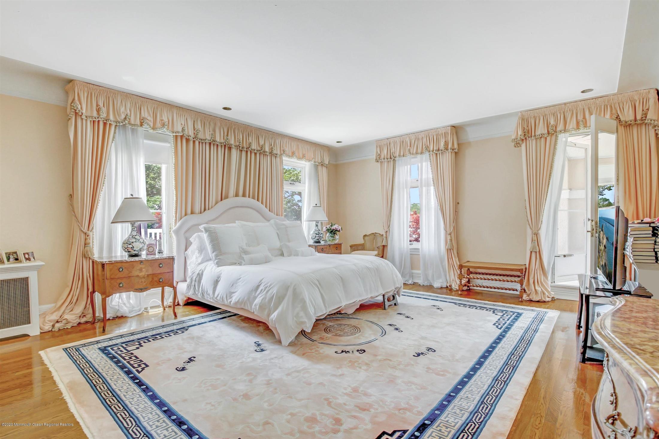 45 Runyan Avenue Deal, NJ 07723 - Photo 33 of 60 a living room with furniture and a large window