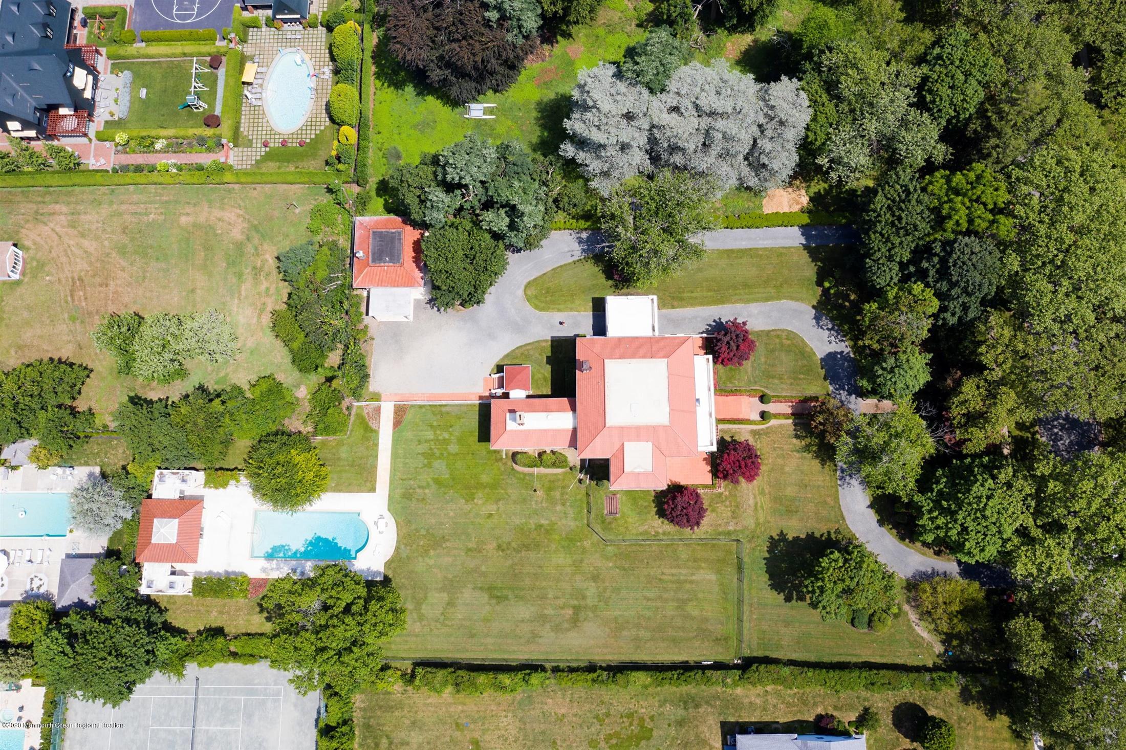 45 Runyan Avenue Deal, NJ 07723 - Photo 44 of 60 an aerial view of residential houses with outdoor space