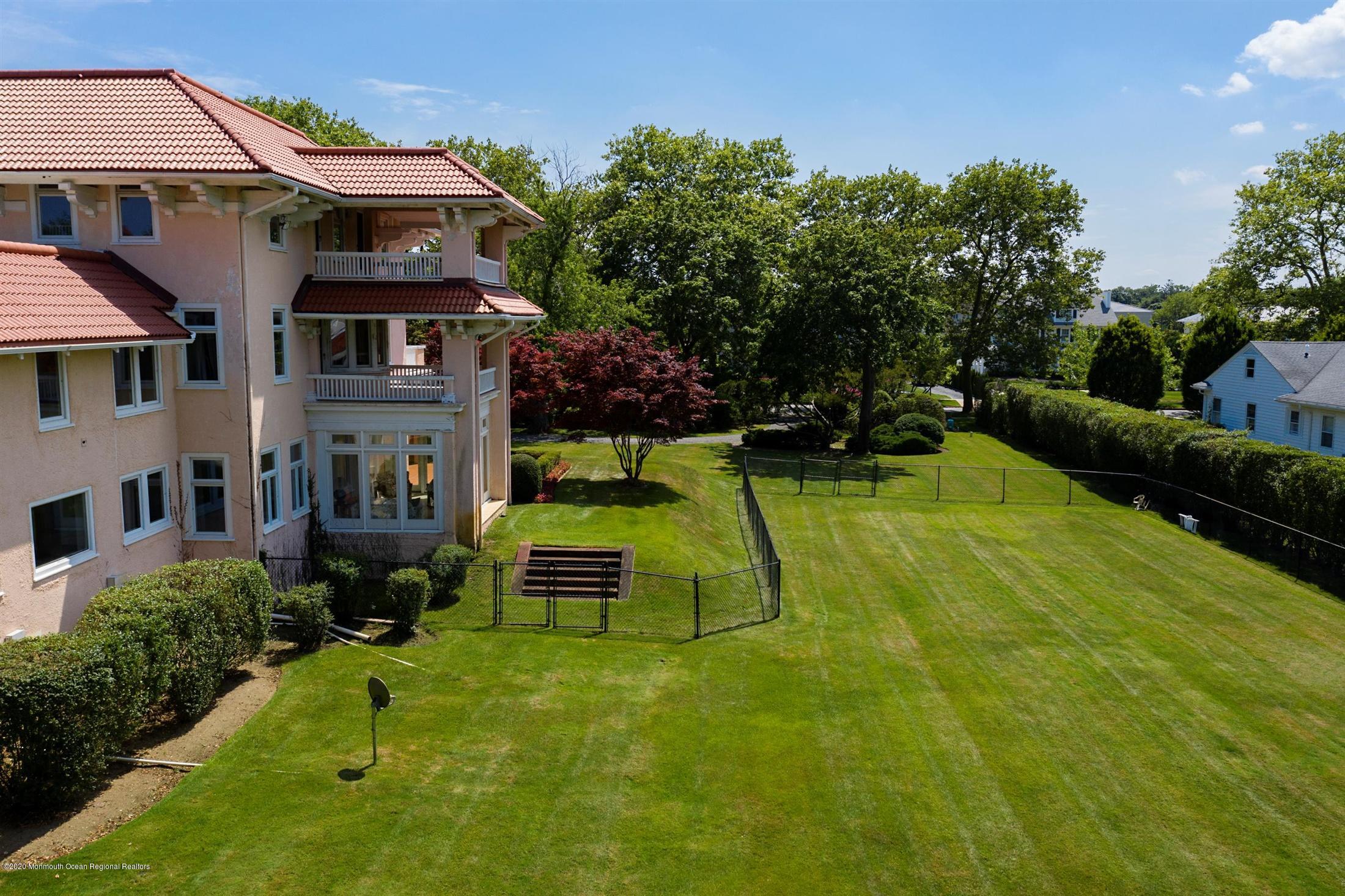 45 Runyan Avenue Deal, NJ 07723 - Photo 49 of 60 a view of a house with a swimming pool