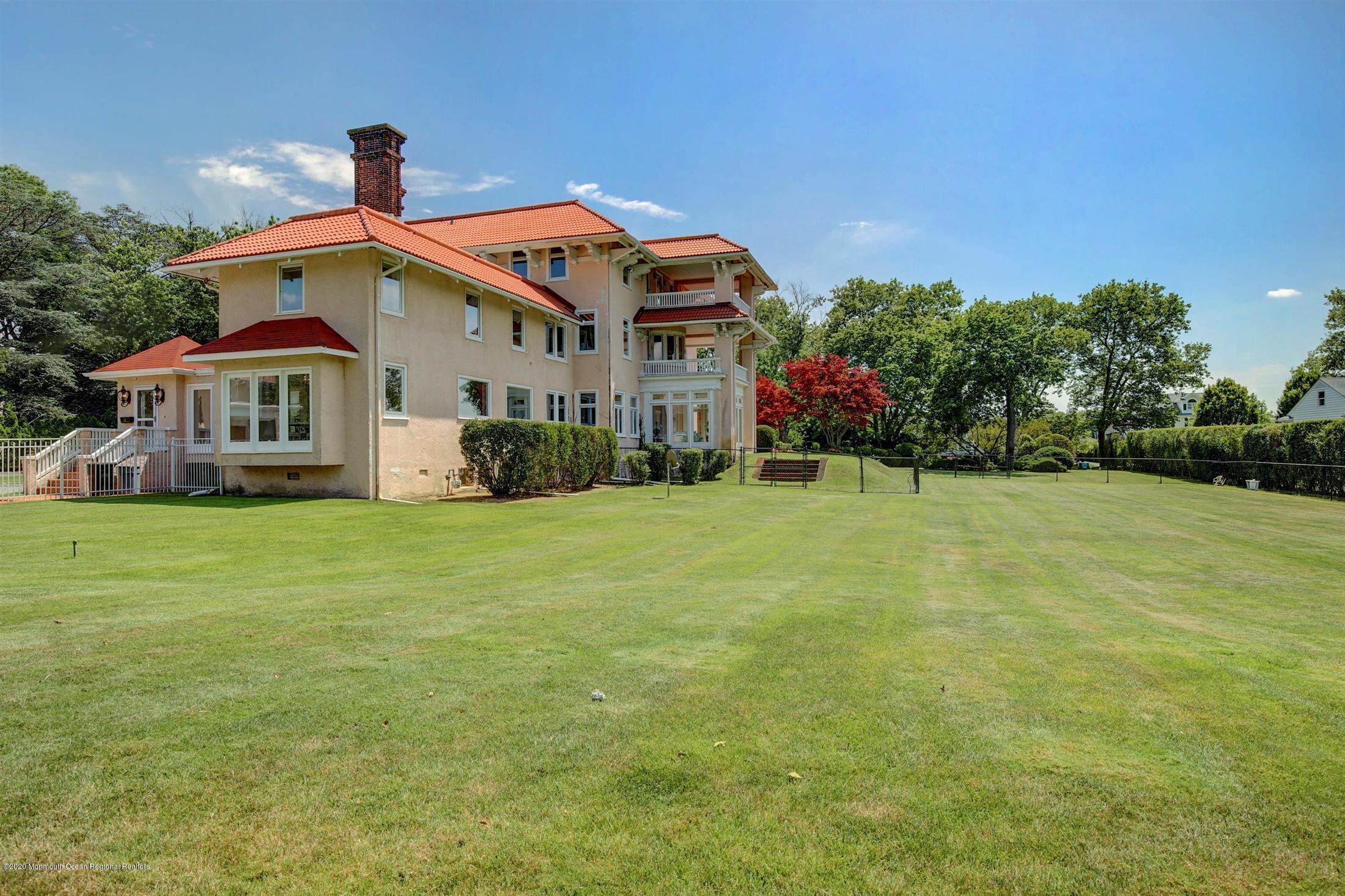 45 Runyan Avenue Deal, NJ 07723 - Photo 52 of 60 a front view of house with yard and green space