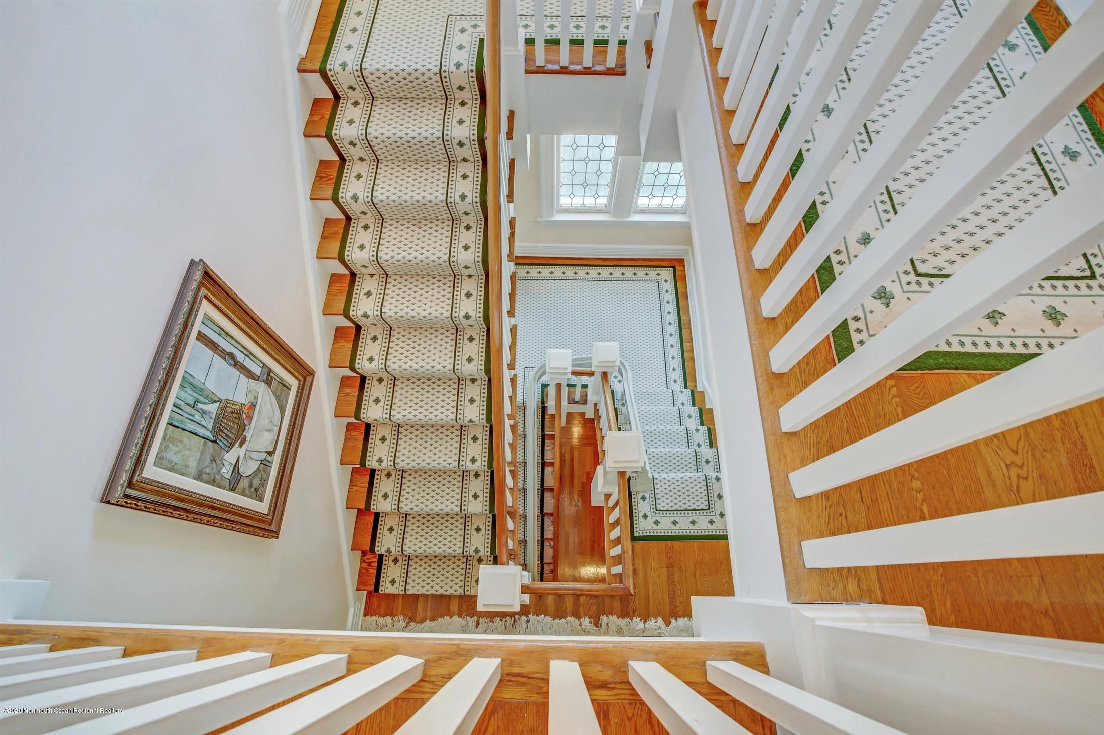 45 Runyan Avenue Deal, NJ 07723 - Photo 7 of 60 a view of staircase with large window