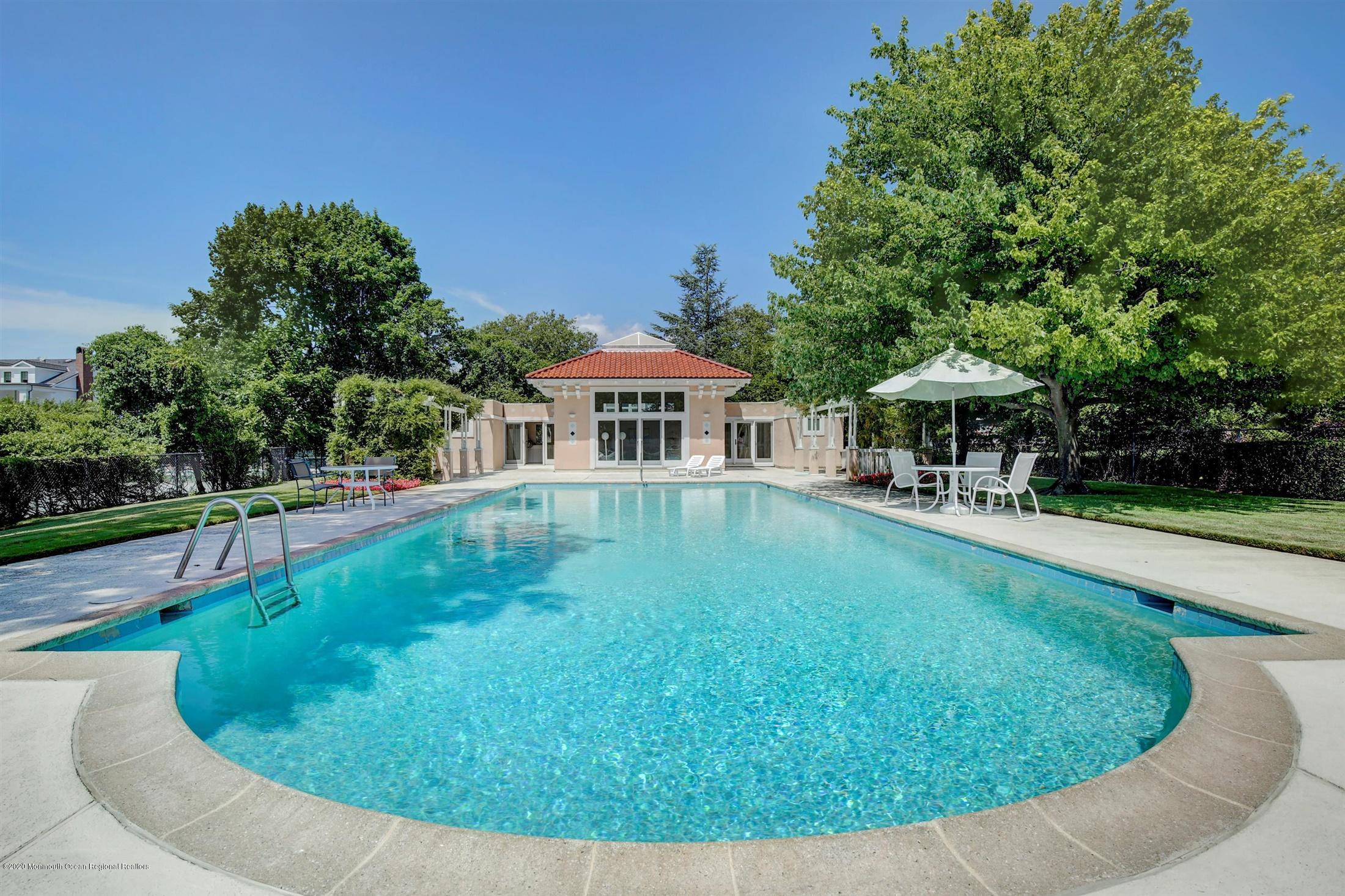 45 Runyan Avenue Deal, NJ 07723 - Photo 8 of 60 a view of a house with a swimming pool
