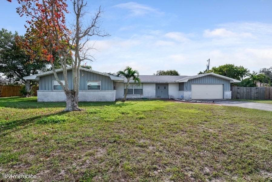 1145 St George Road Merritt Island, FL 32952 - Photo 1 of 11 01_1145-SAINT-GEORGE-ROAD_57_Front-View_