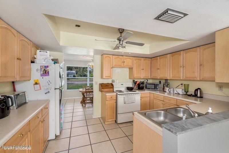 1145 St George Road Merritt Island, FL 32952 - Photo 3 of 11 02_1145SAINTGEORGEROAD_5_Kitchen_FlexMLS