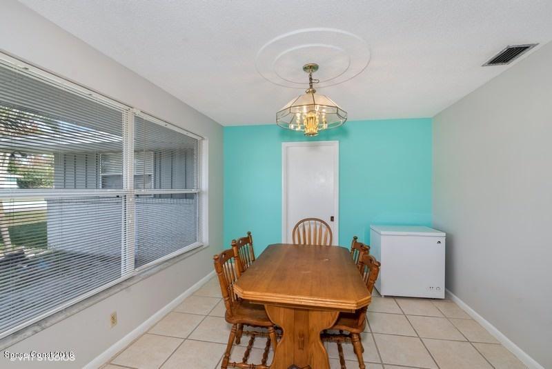 1145 St George Road Merritt Island, FL 32952 - Photo 5 of 11 04_1145SAINTGEORGEROAD_369001_DiningRoom