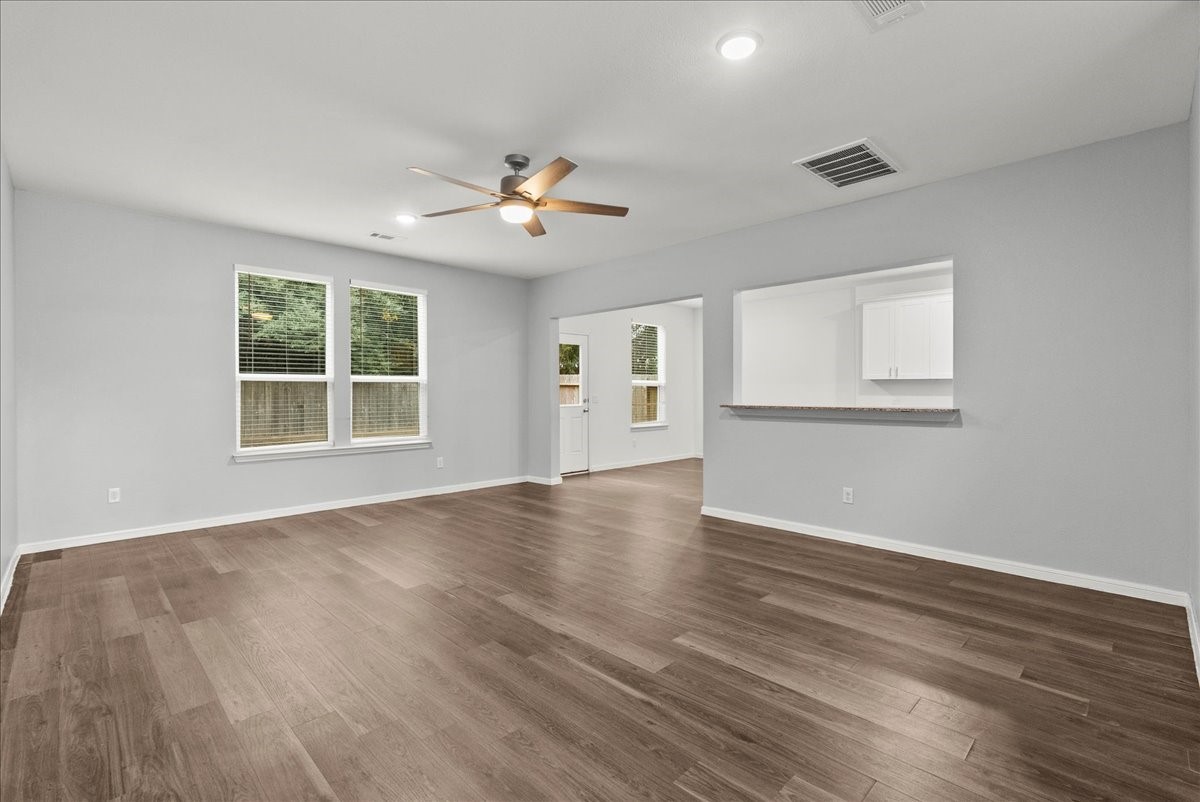 10243 Gates Ml Road Houston, TX 77034 - Photo 5 of 32 Beyond the entry is the open living room with a view of the dinind and into the kitchen.