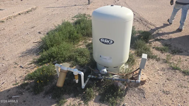 a view of a toilet in a backyard