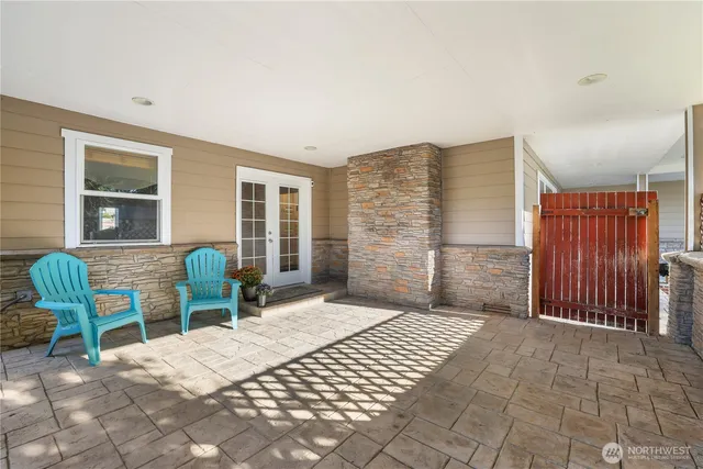 a bedroom with furniture and a window