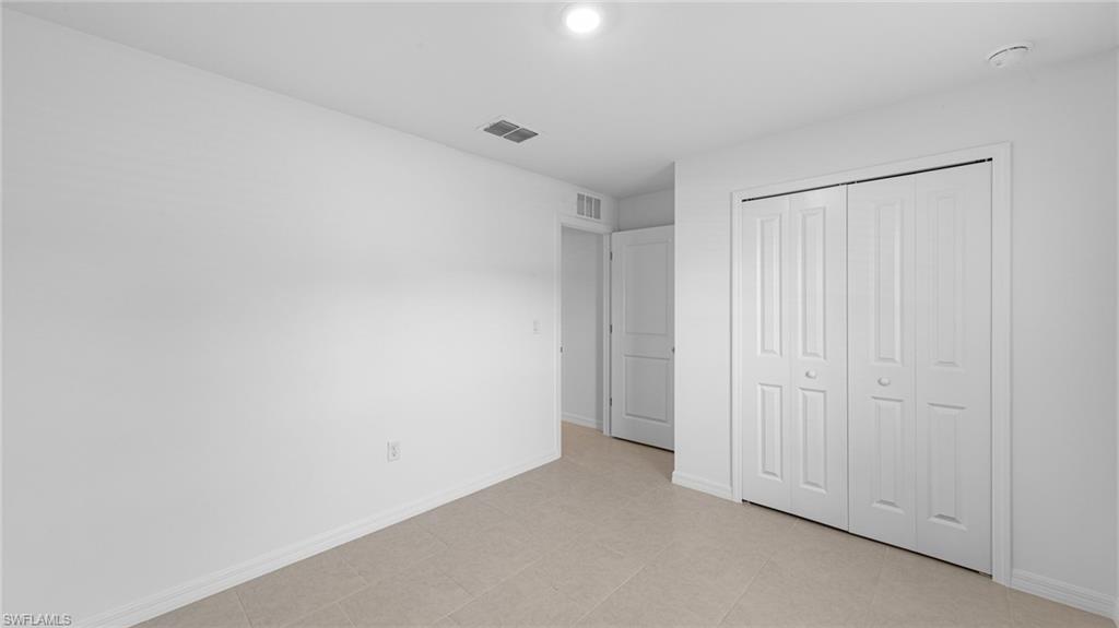 3717 23rd Street Southwest Lehigh Acres, FL 33976 - Photo 10 of 26 a view of an empty room