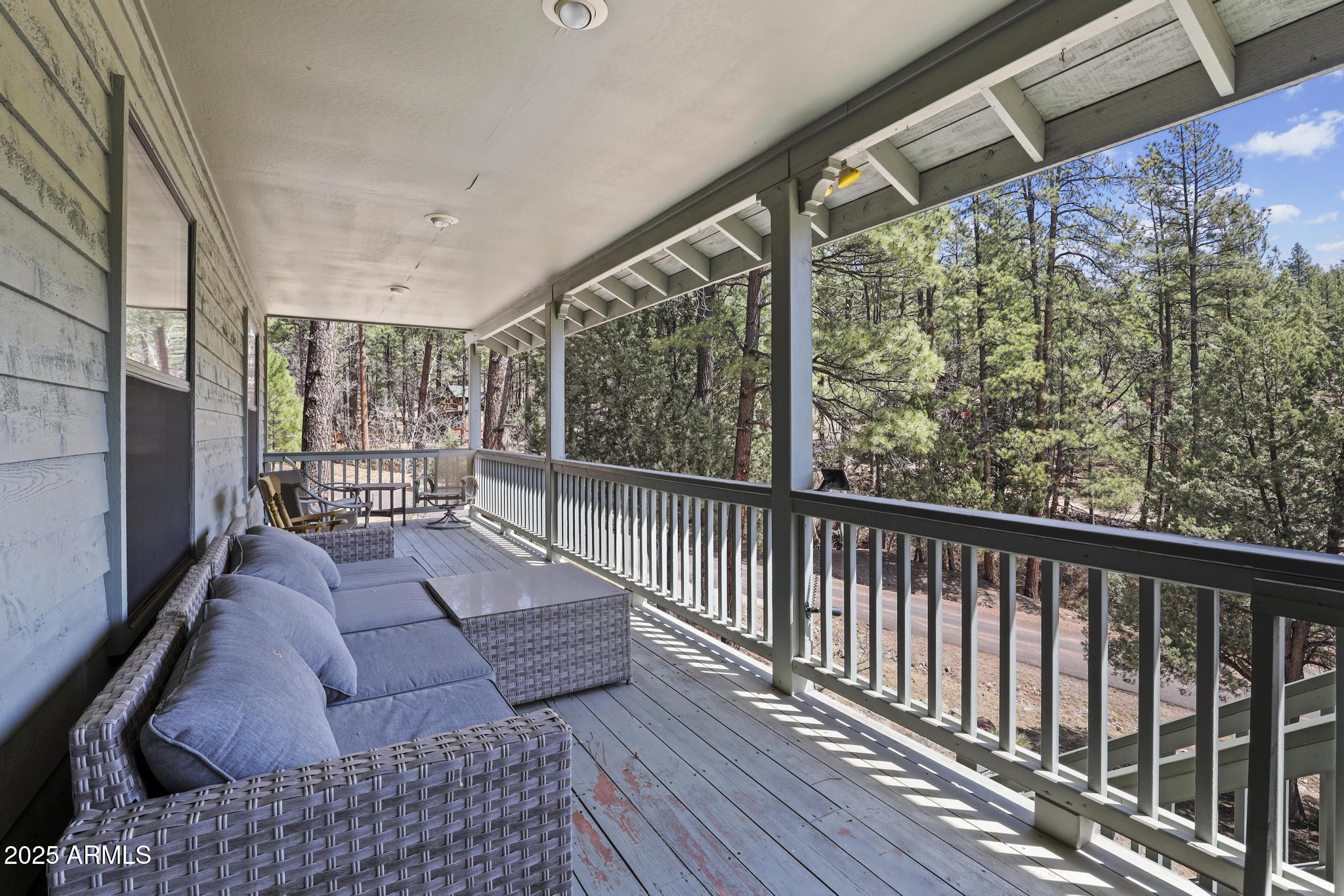 178 Memory Lane Payson, AZ 85541 - Photo 12 of 58 a balcony with wooden floor