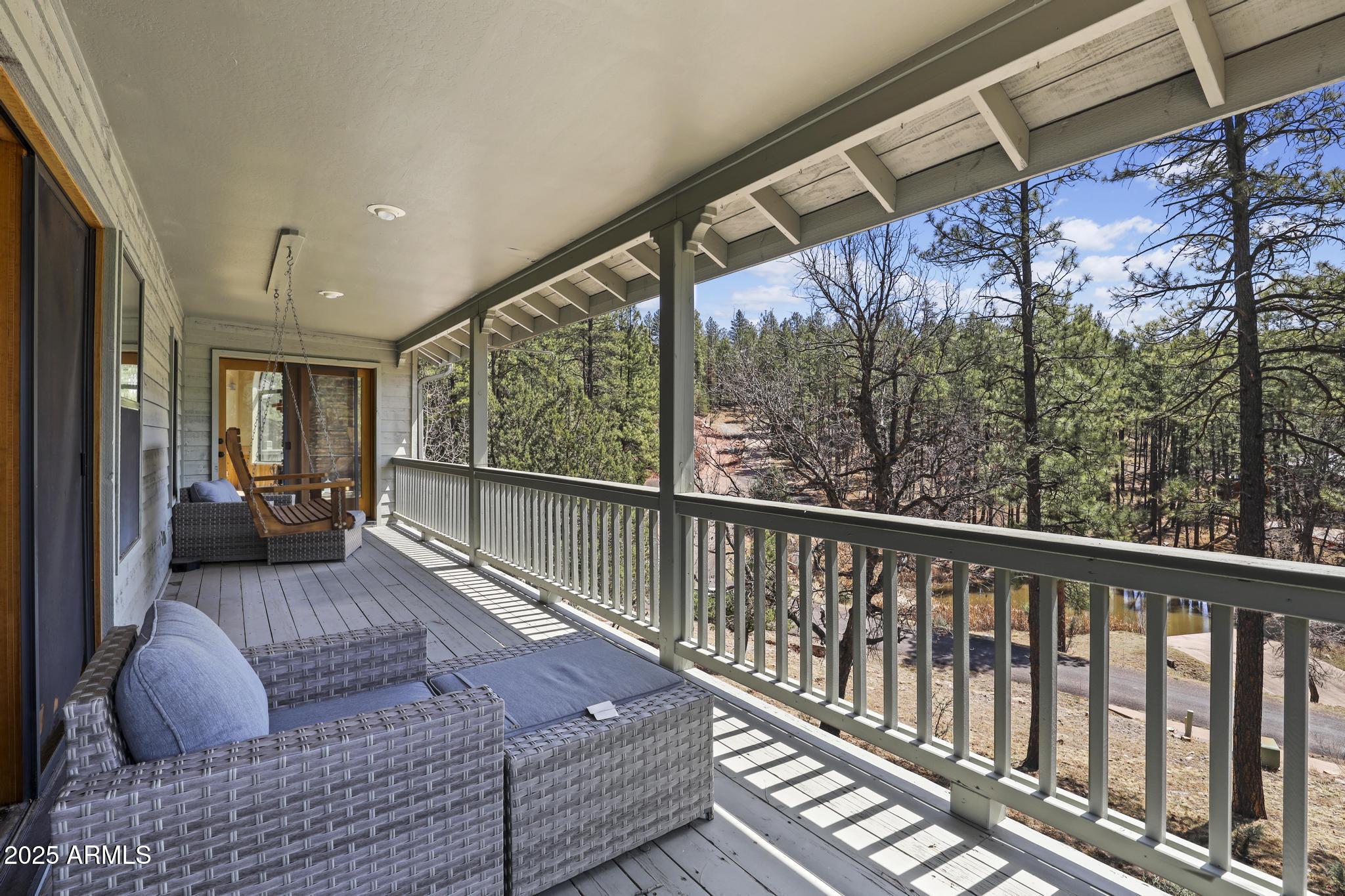 178 Memory Lane Payson, AZ 85541 - Photo 14 of 58 a bedroom with furniture and a large window