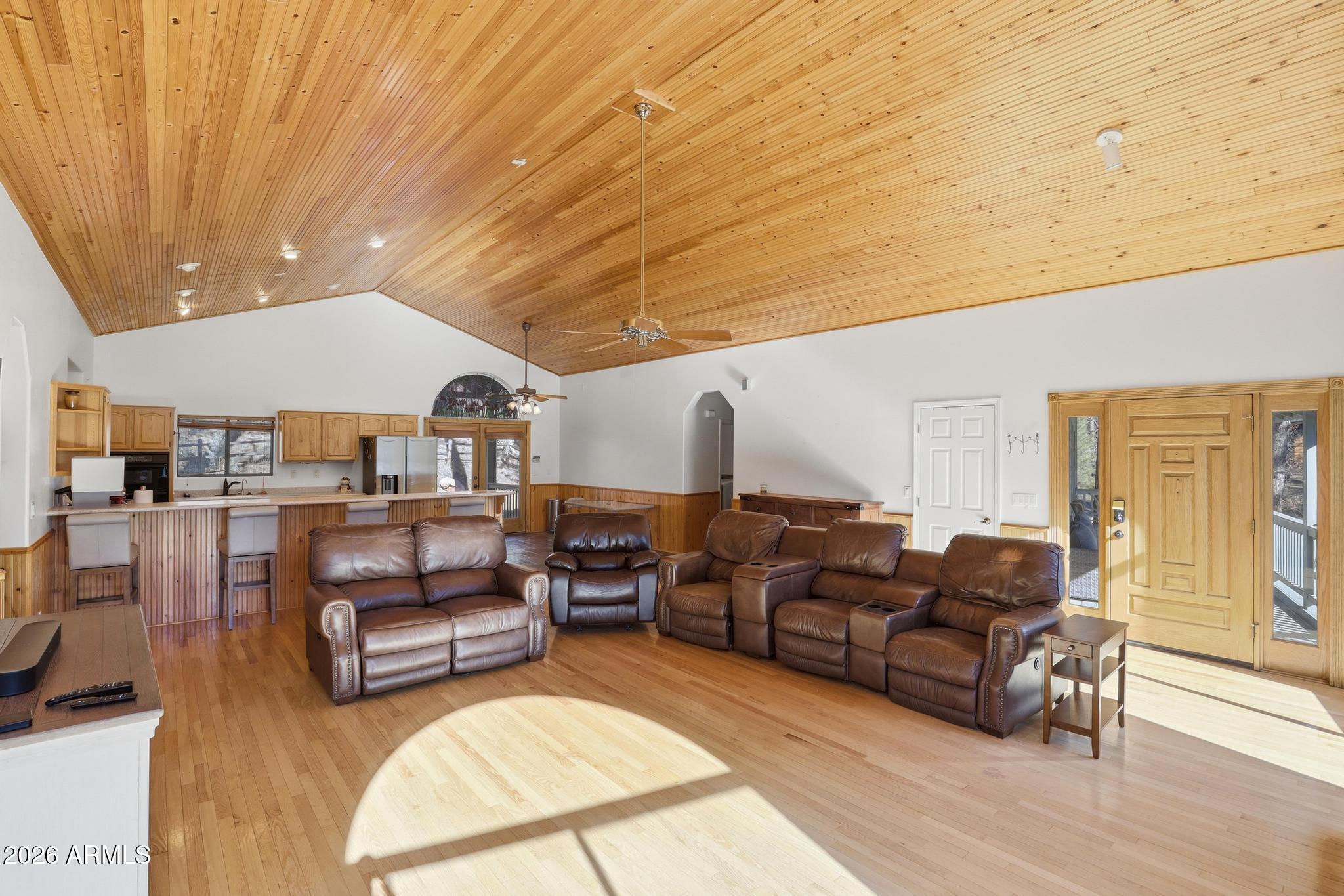 178 Memory Lane Payson, AZ 85541 - Photo 18 of 58 a living room with furniture a couch and wooden floor